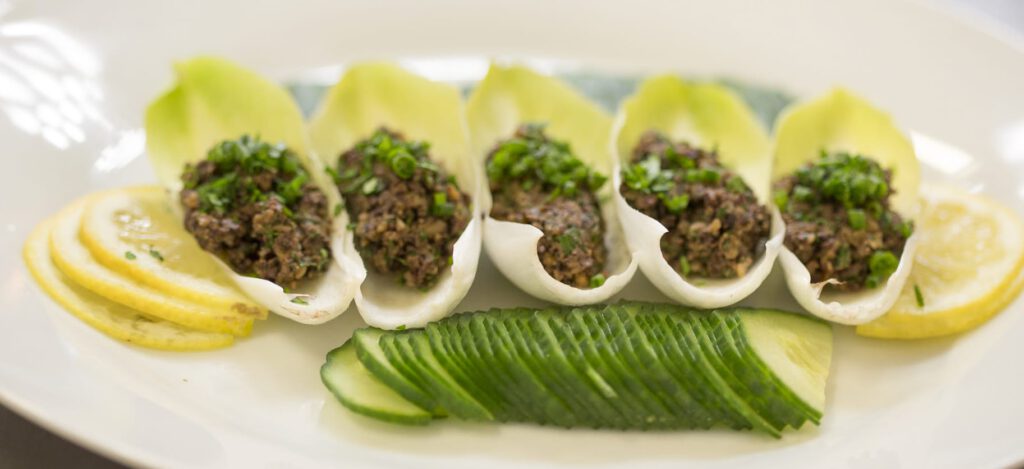 Endive Spoons with Olive + Walnut Tapenade